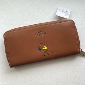NWT Snoopy full sized leather wallet from Coach